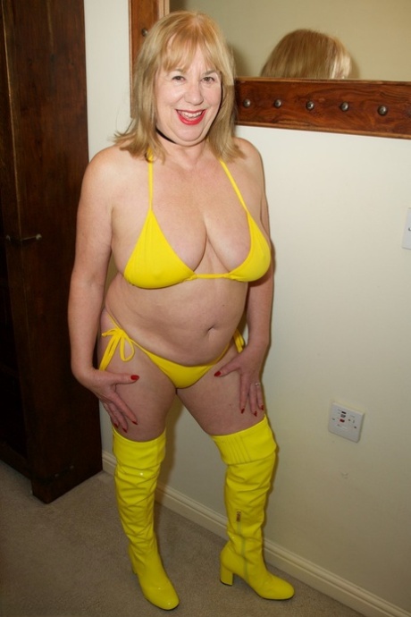 As she masturbates in matching boots, the aged Lady Speedy Bee don a yellow bikini.