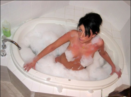 Brunette Teen Carma Takes A Bubble Bath In A Teasing Fashion