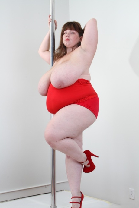 SSBBW Lexxxi Lux is seen on a stripper platform after receiving oral sex.