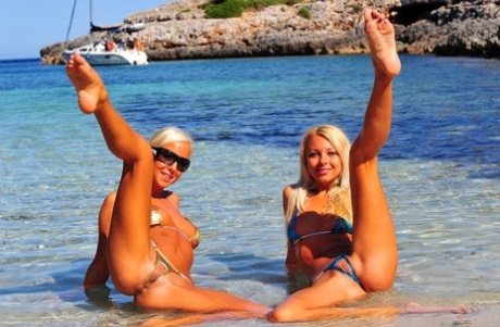 Blonde Girl Natali Blond And Her Girlfriend Take Off Their Bikinis In The Sea