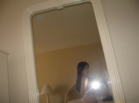 Cute GND teen Anna takes selfshot pictures of her round perfect ass in the