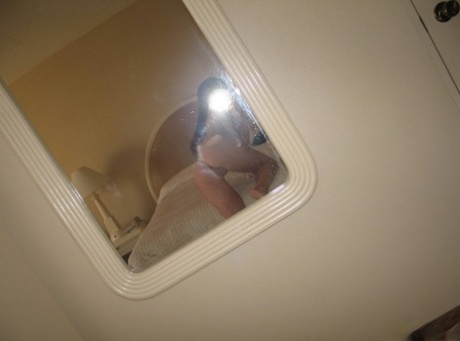 Cute GND teen Anna takes selfshot pictures of her round perfect ass in the