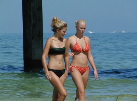 In private, young girls can be seen wading into the sea in their bikinis.