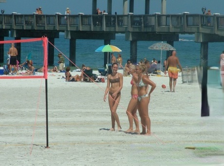 Playing in the sun: Hot girls on a trip to the beach (left) by GND Candid