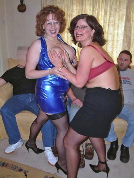 Curvy British woman Claire and her girlfriend engage in group sex.