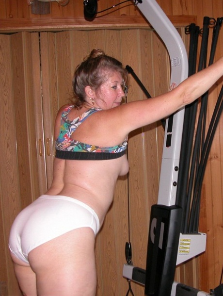 At her mature age, Devlynn reveals herself in public and enjoys taking turns with home gym equipment.