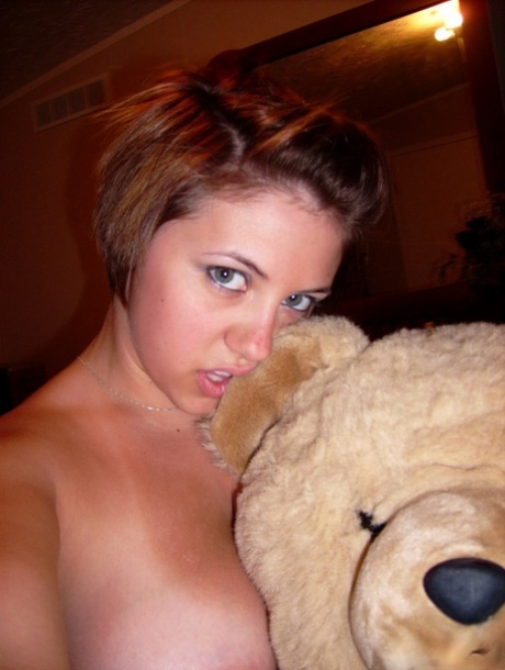 Chubby Amateur With Short Hair And Big Tits Takes A Series Of Self Shots