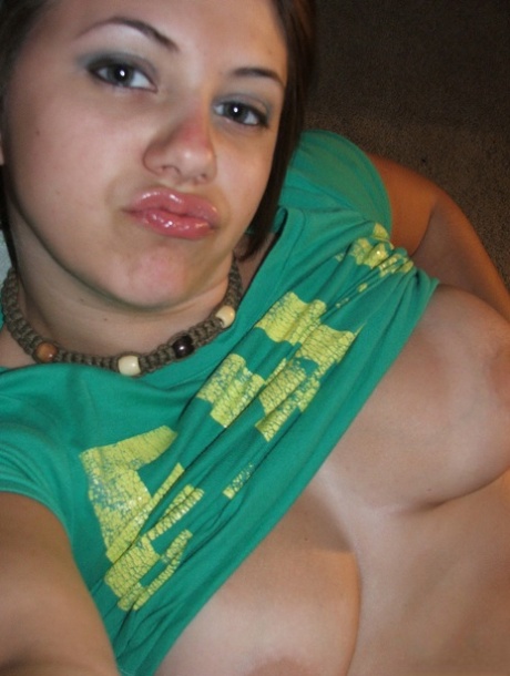 Young Looking Amateur Takes Self Shots Of Her Big Natural Boobs