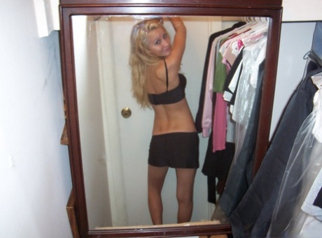 Blonde teen Kylie takes s topless SFW selfies in front of a mirror