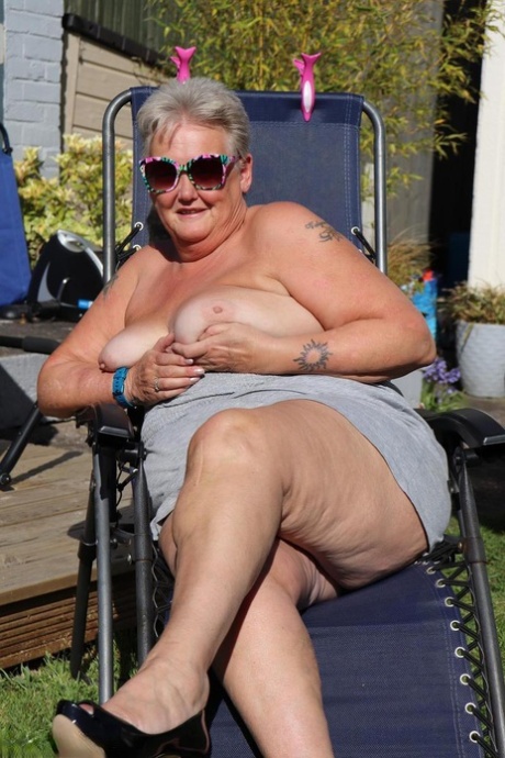 Fat Nan Valgasmic Exposed Shows Her Tits And Snatch On A Backyard Lounge Chair