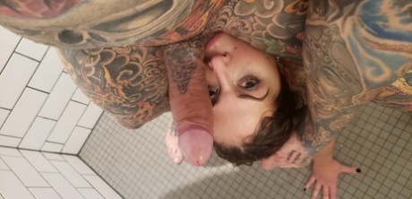 A cumshot wound in the mouth of Heidi Van, a girl with tattoos, occurred after she had taken anal injections in a shower.