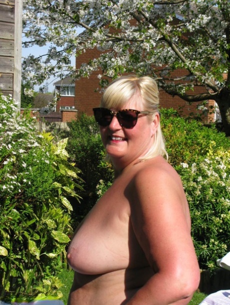The yard was the site where Chrissy Uk, a large and overweight woman, attempted to masturbate for the first time. She then had a sexual encounter with a naked man and sucked a dick in response.