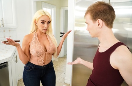 Her boobs are visible as Kylie Kingston, the hot-headed blonde, blows off her hair before passing it around to her stepson.