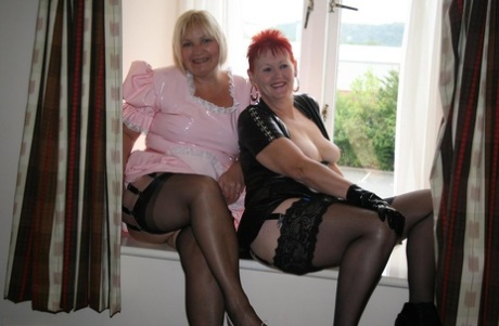 An older redhead named Valgasmic Exposed and her same-sex partner expose themselves.