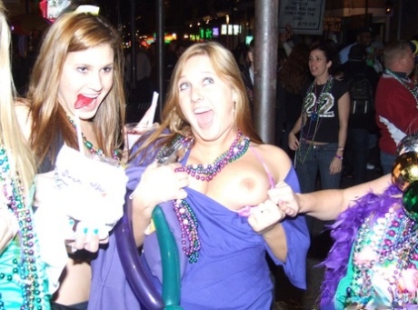 Girls in a state of sobriety display their tits while out in public.