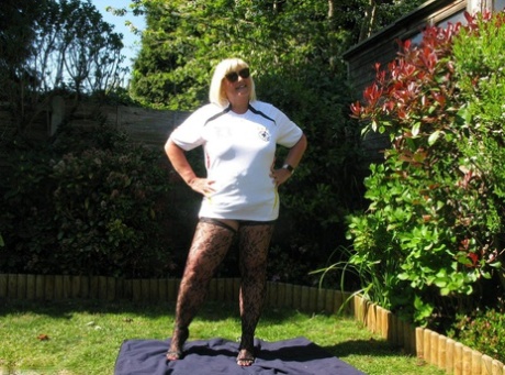 In her backyard, the blonde and fatty Chrissy Uk is naked in nylons at her age.