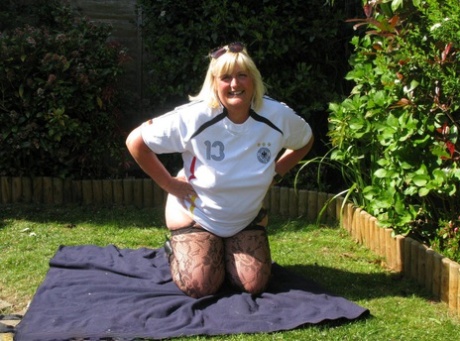 Nook: Aged 40-year-old blonde fatty Chrissy Uk strips off in nylons at her backyard.