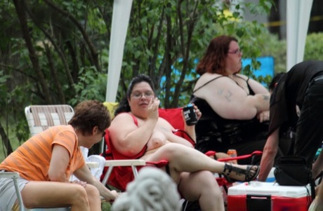 Non-professional females exhibit their tits and pussies at a clothing optional event.