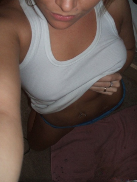 Blonde Chick Takes Self Shots While Wearing A Tank Top And Pretty Panties