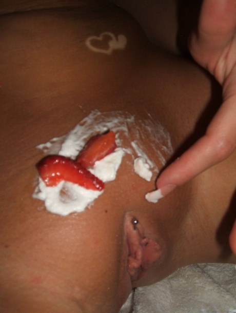 The nipple and pussy of an amateur girl are covered in whipped cream as she gets nude.