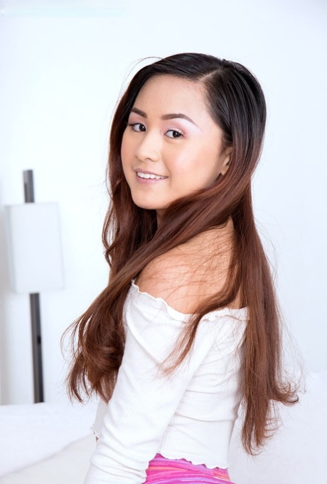 The small tits and flexibility of Elle Voneva, a young Asian girl, are showcased all at once.