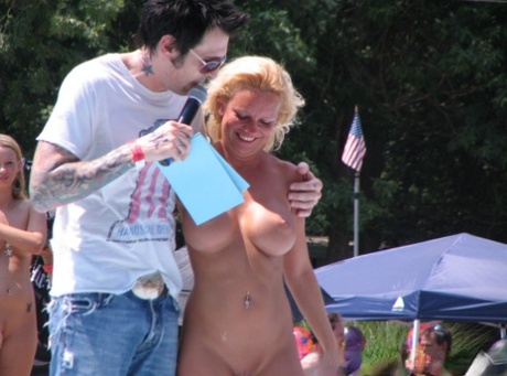 Amateur photographers are spotted in different attire options at a clothing optional club.