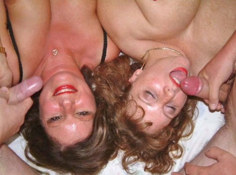 A hardcore orgy is performed by an older British amateur named Claire and her girlfriend.