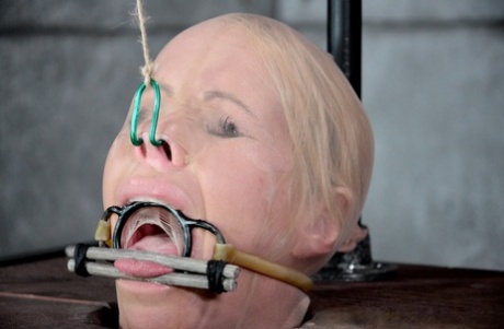 Blonde Female Simone Sonay Is Rendered Helpless In A Basement Dungeon