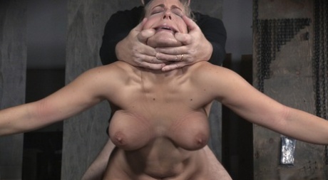 Naked blonde chick Angel Allwood undergoes extreme fucking in bondage