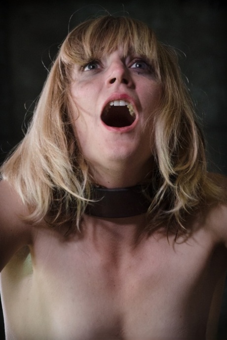 Clothed Female Mona Wales Finds Herself Being Restrained In A Dungeon