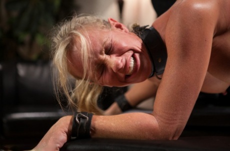 An incredibly painful training session is given to a blonde sex slave.