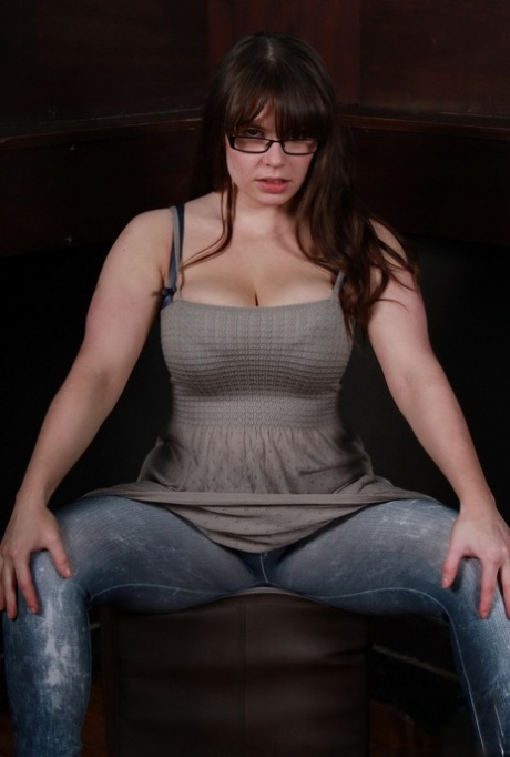 Amateur BBW Georgina Gee Uncups Her Huge Tits As She Gets Naked In Glasses