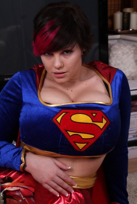 To showcase her super tits, Dors Feline cosplay girl shows off the costume of the super hero.