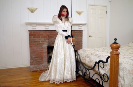 Brunette Bride Celeste Star Is Ballgagged And Tied Up In Her Wedding Dress