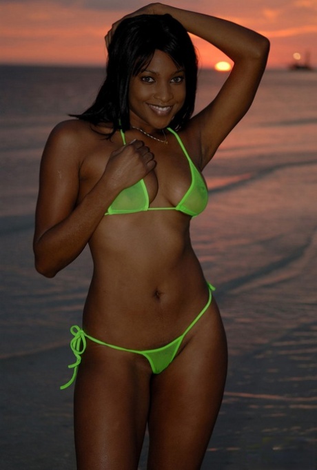 Black Girl Samone Poses In A Skimpy Bikini While The Sun Sets Over Beach