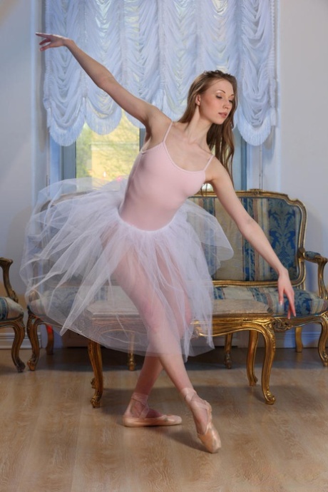 Annett A, a beautiful 18-year old ballerina who is now naked, participates in solo action.
