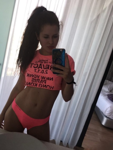 Beautiful Dark Haired Julia In Skimpy Outfits Taking A Sexy Selfie
