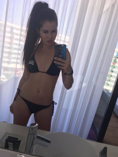 Beautiful Dark Haired Julia In Skimpy Outfits Taking A Sexy Selfie