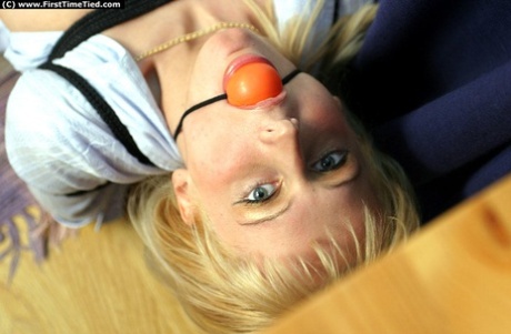 For the first time, a busy blonde amateur performs a ball gag.