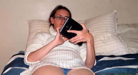 Barefoot Amateur Removes Her Sweater While Wearing Panties And Glasses
