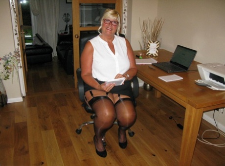 Working from her home office, blonde fatty Chrissy Uk expose herself.