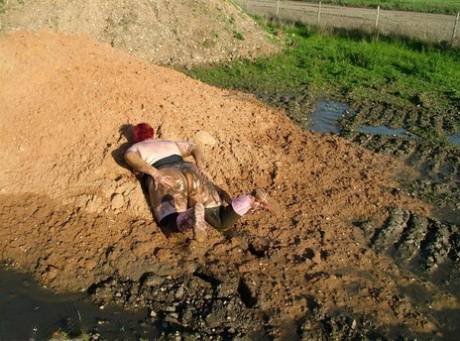 The chubby and overweight Valgasmic Exposed are covered in mud at a young age.