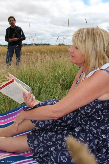 A hay field leads to an encounter with an old-age UK doggystyle on a blanket.