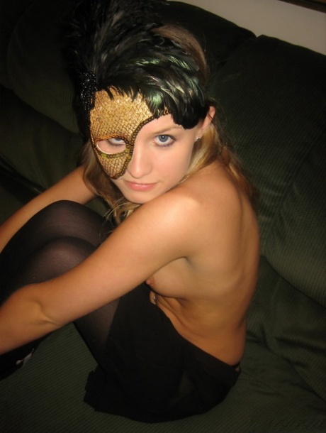 First Timer Wears A Masquerade Mask While Getting Naked In Black Stockings