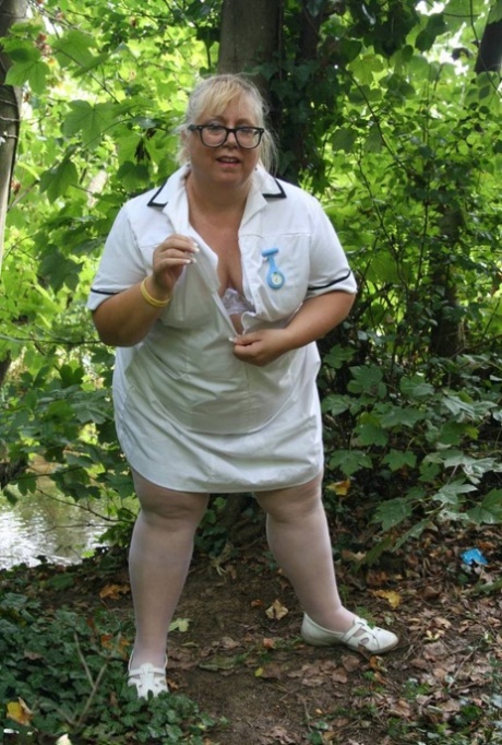 Obese Blonde Nurse Lexie Cummings Has Sex With Two Men In The Woods
