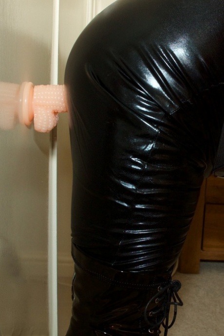 A Thick amateur named Dirty Doctor uses a suction dildo made of latex to stimulate her vagina.