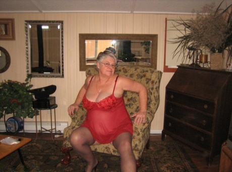 Old Woman Girdle Goddess Slips Off Red Lingerie To Get Naked In Stockings