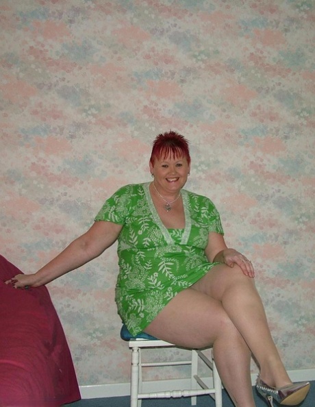 The old redhead BBW Valgasmic had his pantyhose slung over and on a wooden chair.