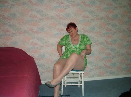 A wooden chair was used by an older redhead named BBW Valgasmic to expose himself while wearing pantyhose.