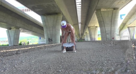 Underpass: Shortly, short-haired girl Chloe Lamour takes a badly needed lick.